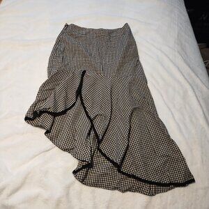 Two Skirts, one red polka dot pencil and one black/white plaid small